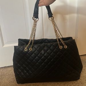 Quilted purse with chain strap detail